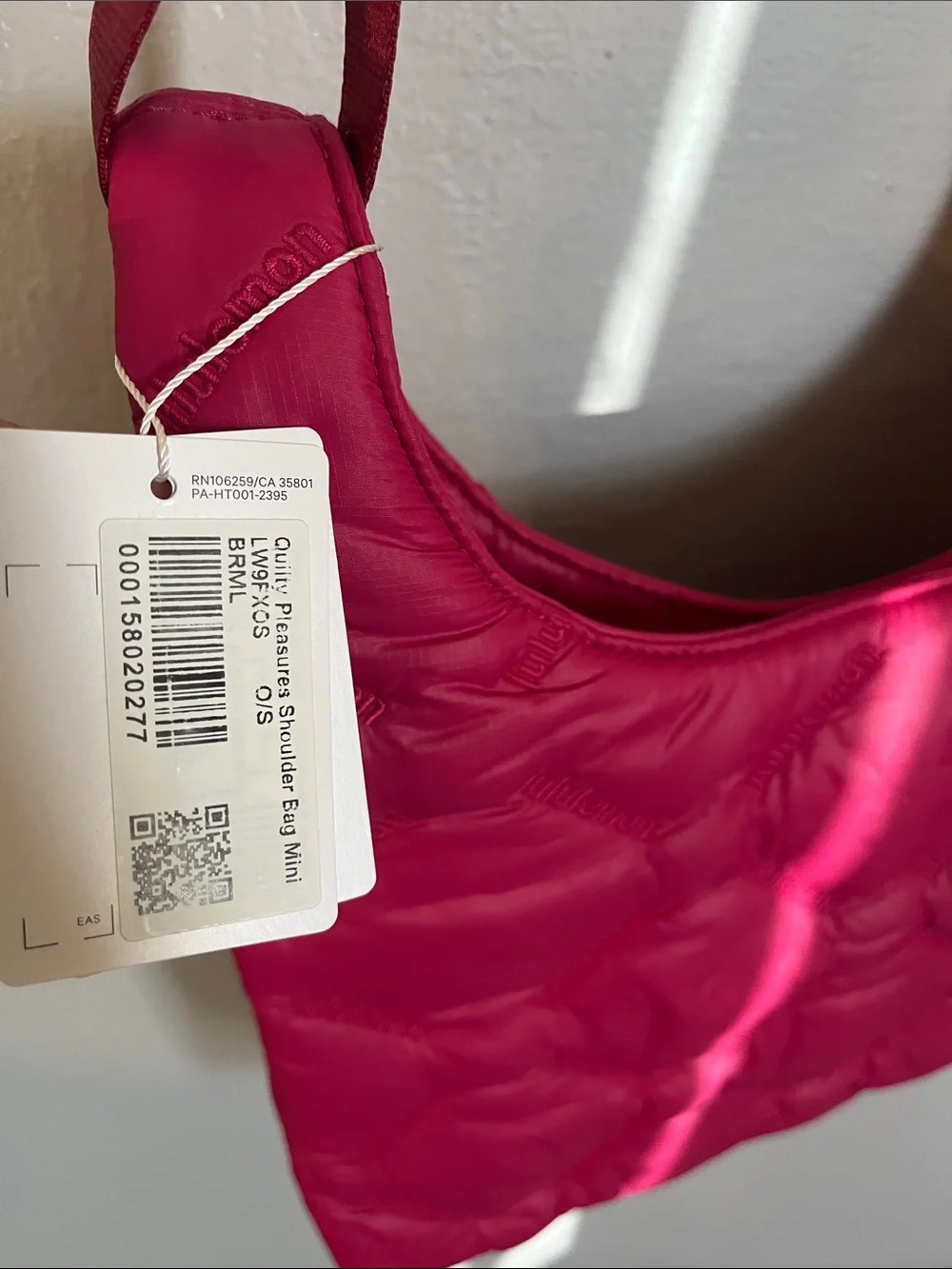 Lululemon quilty pleasures bag in berry rumble